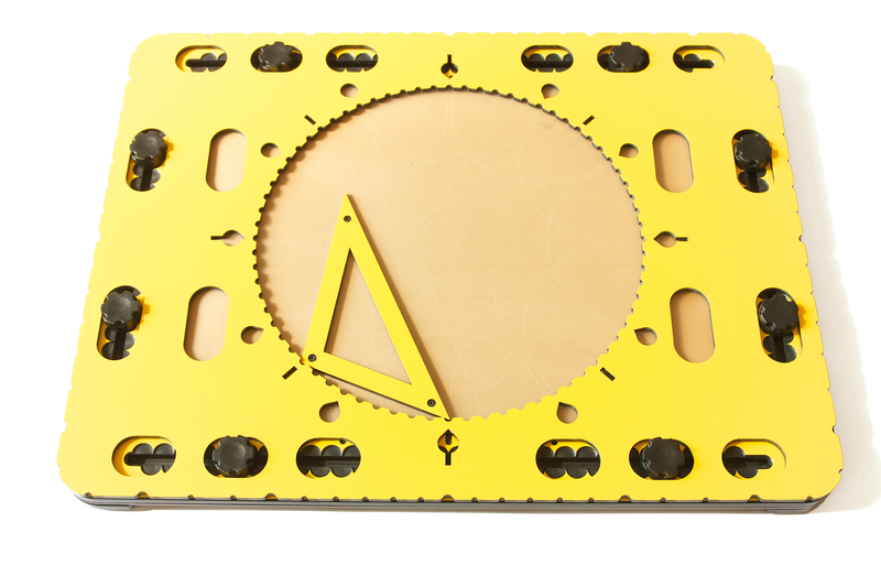 Photo of a CircleFrame on a TactiPad. The circle hole in the middle has the Triangle add-on inside it. 