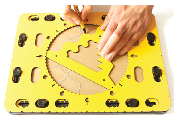 TactiPad with CircleFrame and Christmas Tree add-on in use by two hands.