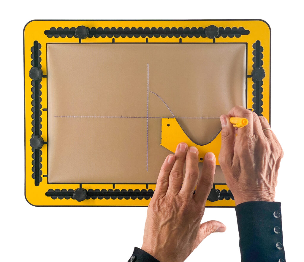 Creating a graph of a cosine wave using the SinTang tool. The first section to the right of the y axis has already been drawn; the tool has been rotated 180 degrees to draw the next section to continue the cosine wave.
