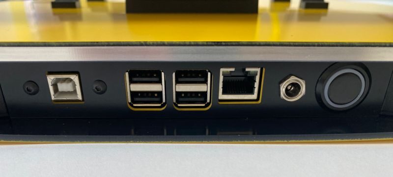 The backpanel containing the power controls and connection ports. See the description below.